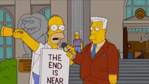 Sur la pancarte d’Homer: “La fin est proche” — The Simpsons: Saison 16, Episode 19 — Thank God it’s Doomsday / C’est l’apocalypse, Dieu merci !